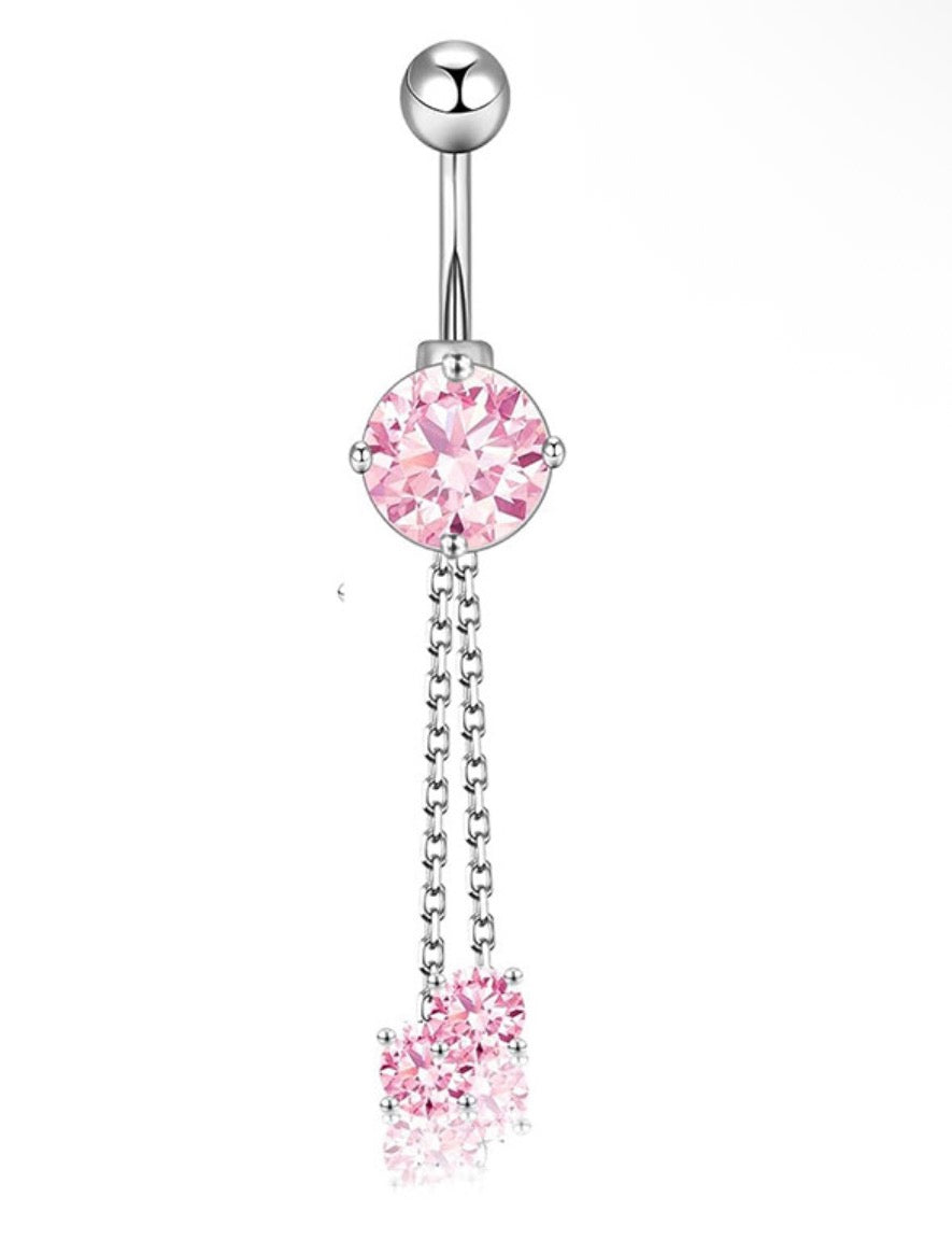 pink and silver belly piercing