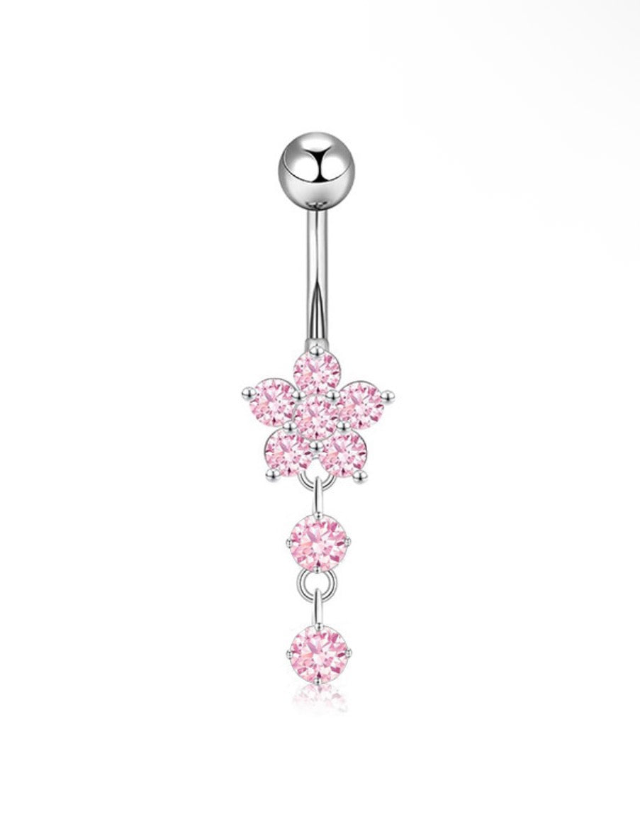 pink and silver flower belly piercing