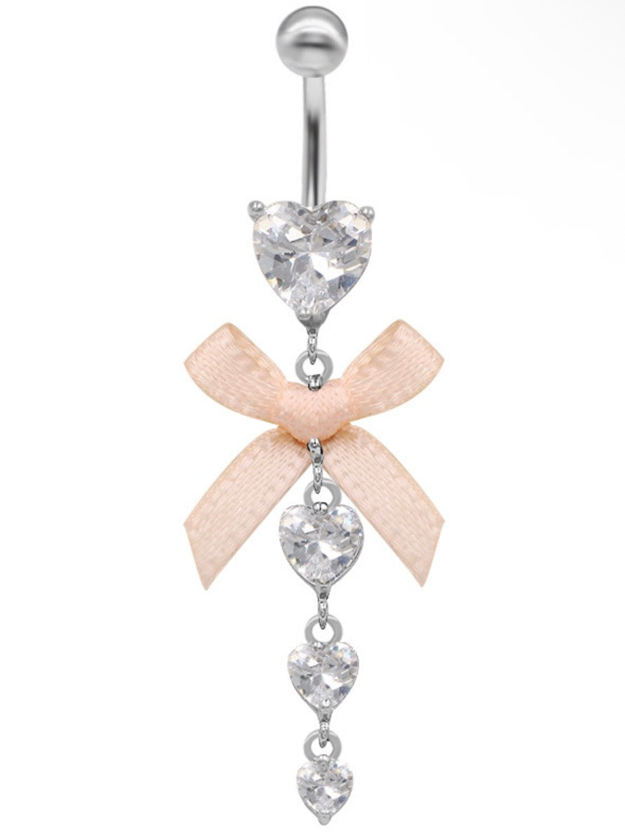 baby pink and silver belly piercing
