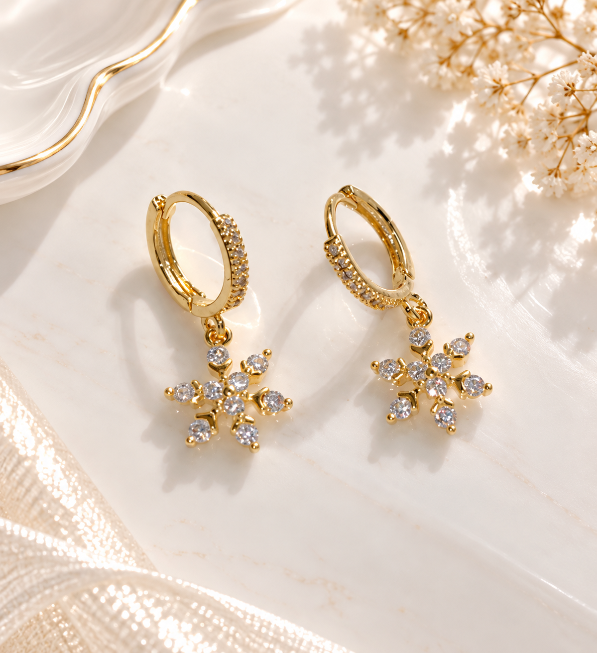 snowflake gold earrings