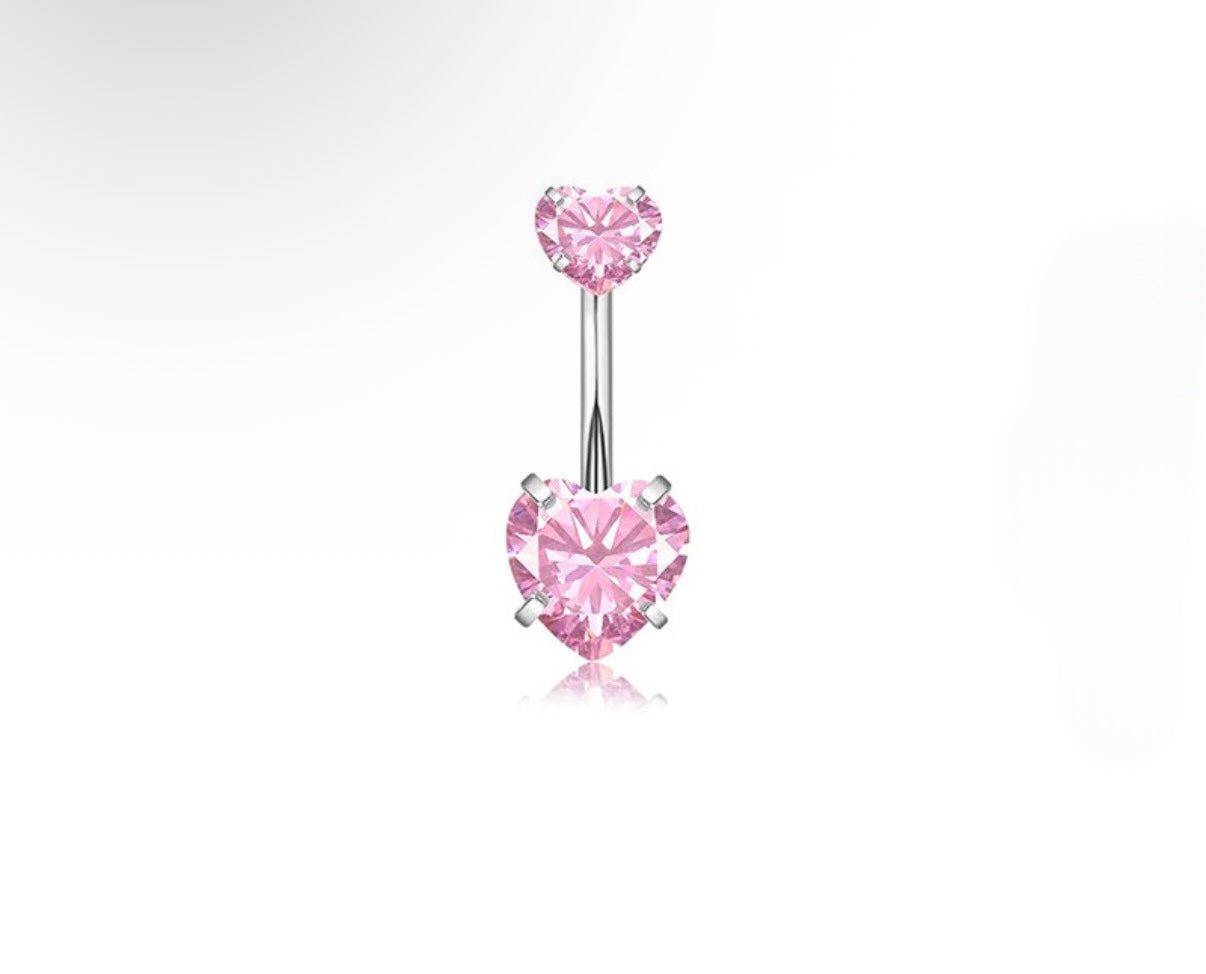 pink and silver belly piercing