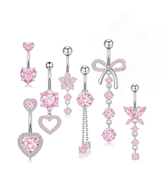 7 pink belly piercings