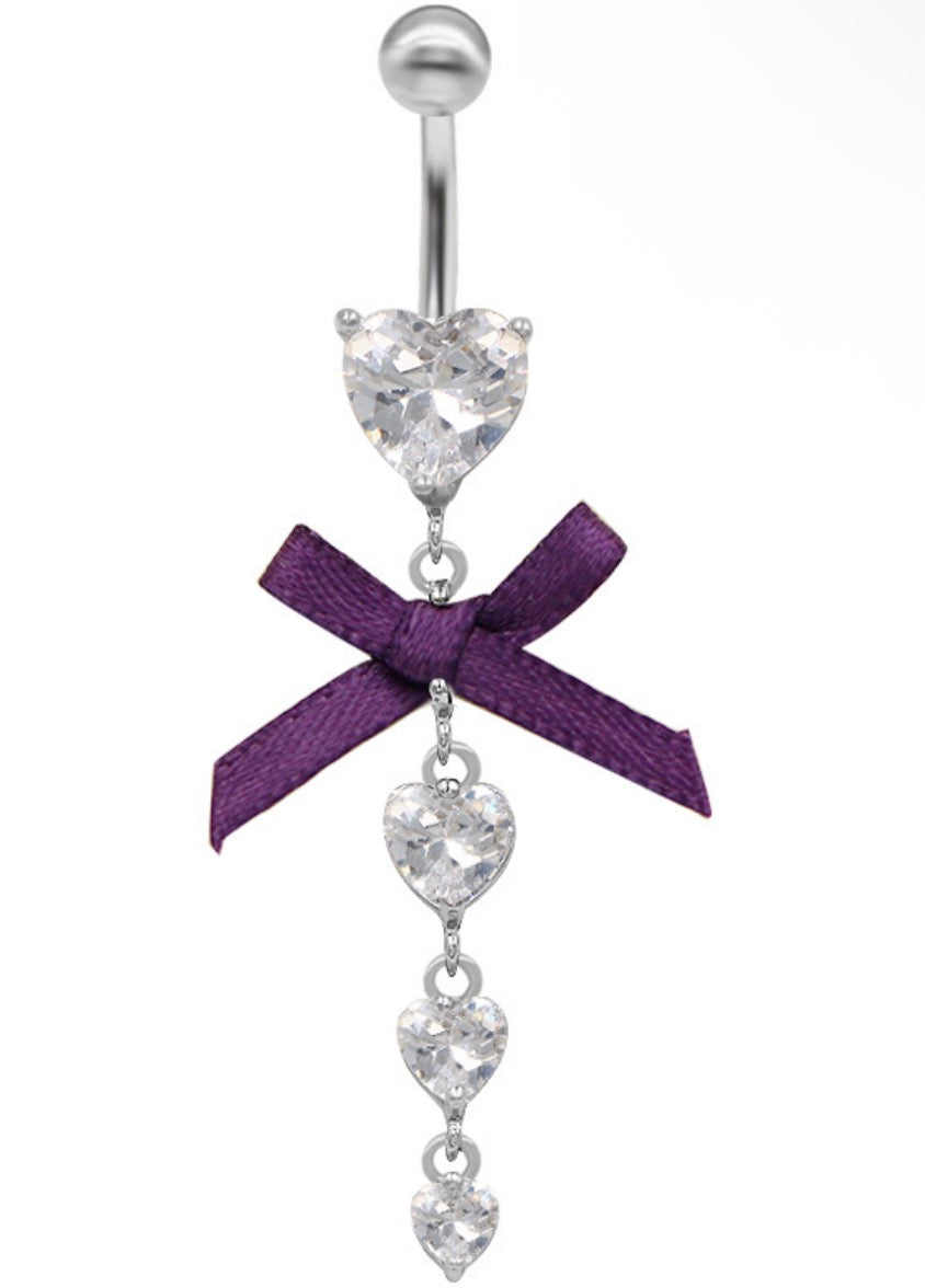 silver and purple belly piercing