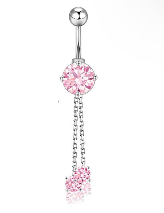 pink and silver belly piercing