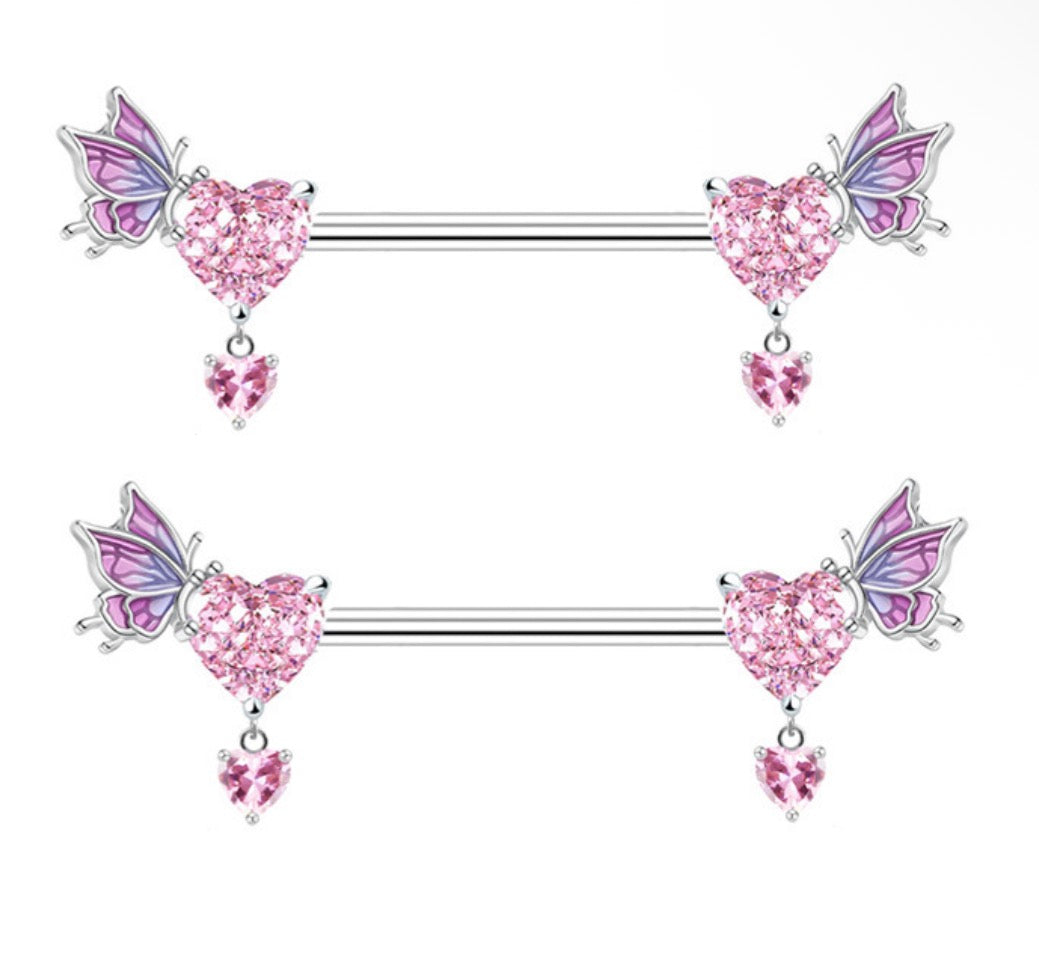 silver and pink nipple piercings