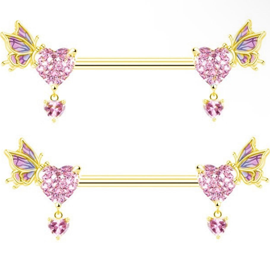 Gold and pink nipple piercings