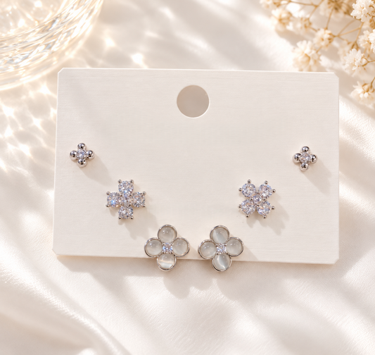 3 pairs of silver earrings