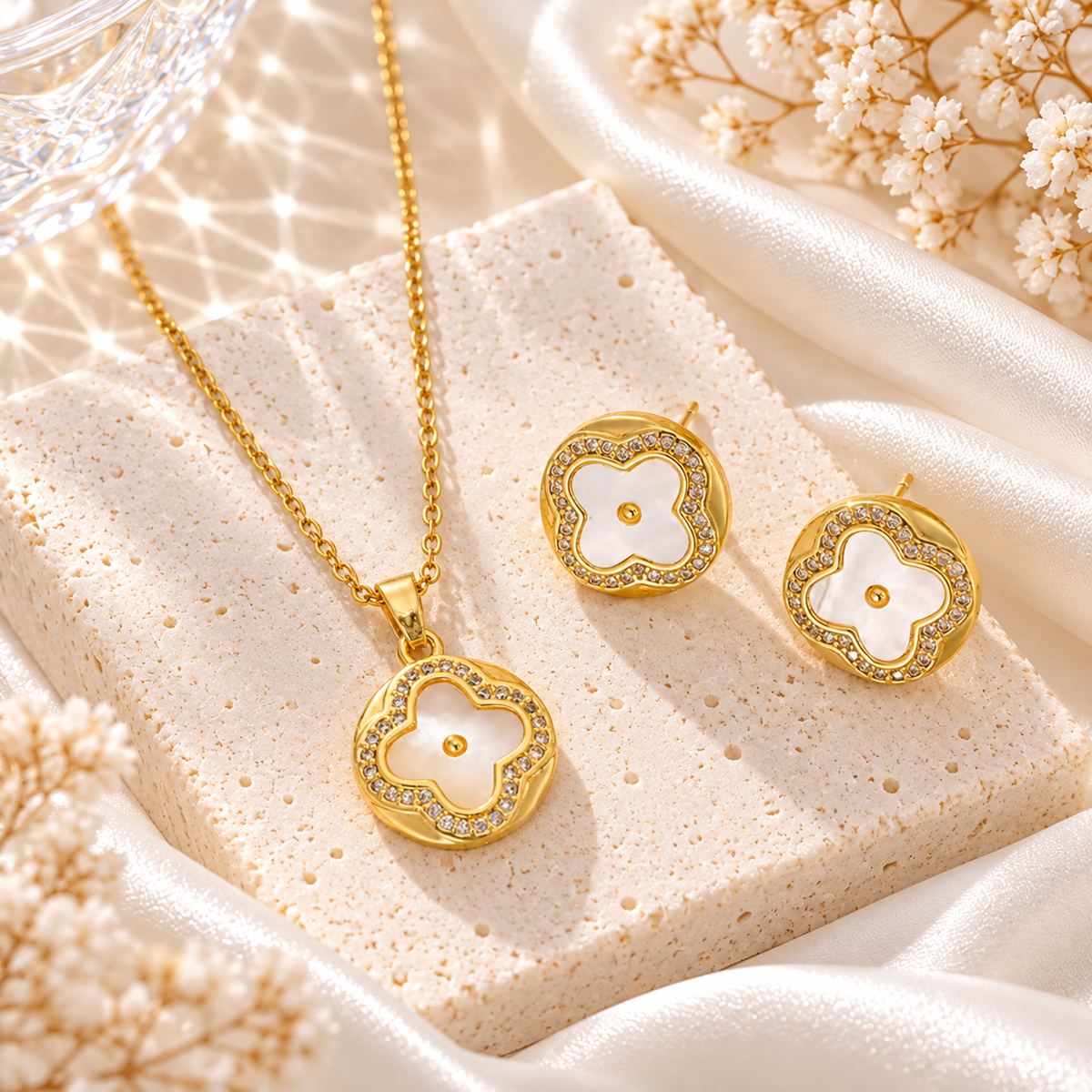 gold necklace and earrings clover set
