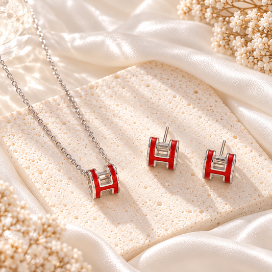silver and red H set earrings and necklace