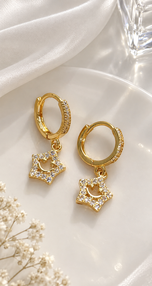 gold earrings star