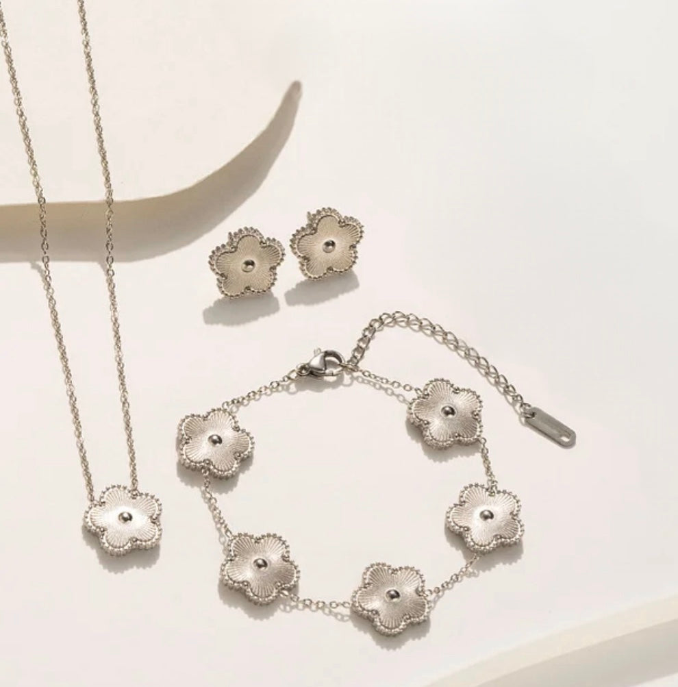 silver necklace earrings and bracelet set