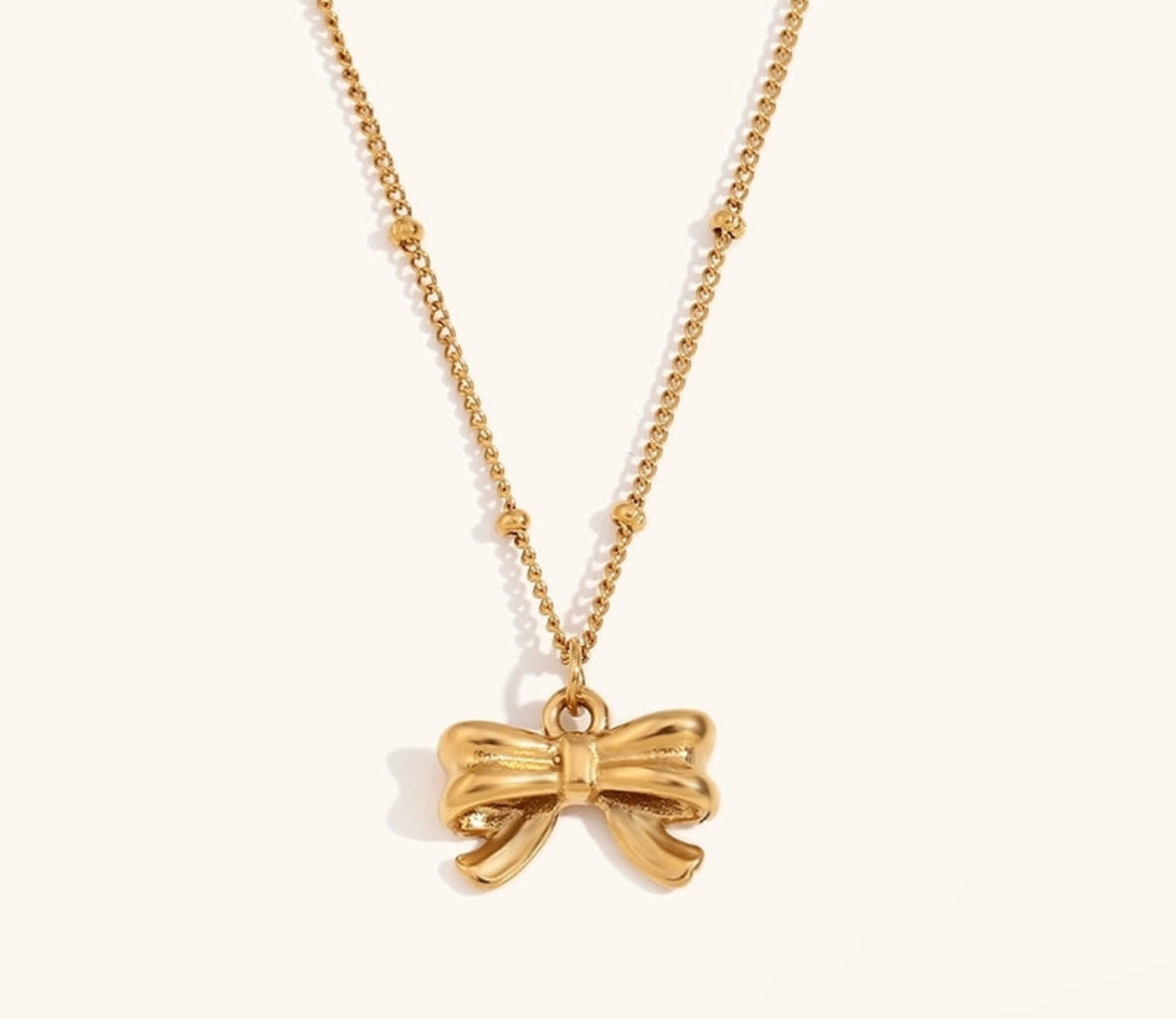 Bow titanium steel 18k gold plated necklace