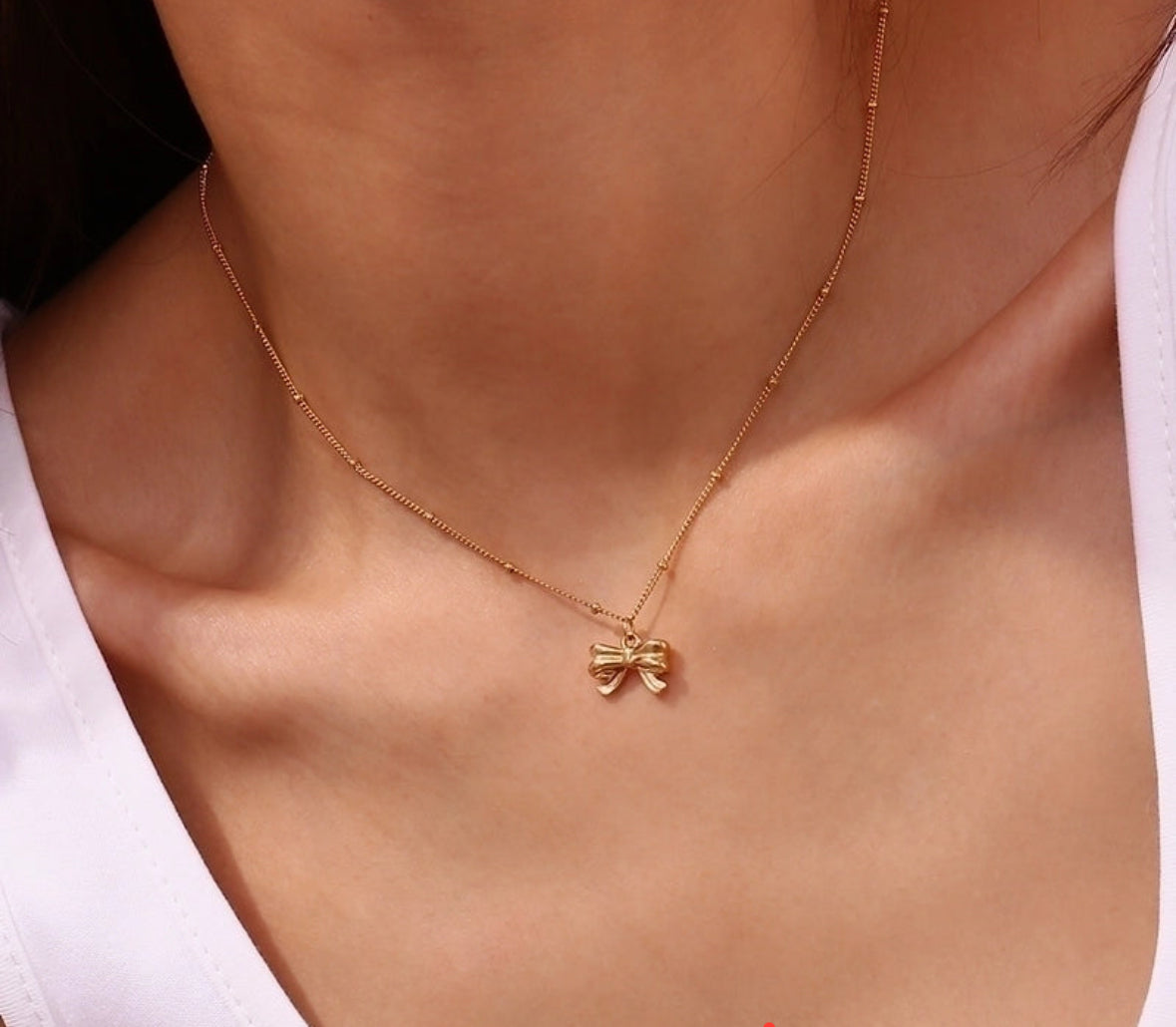 Bow titanium steel 18k gold plated necklace